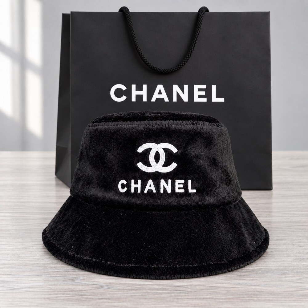 CHANEL Black Shearling Logo Bucket Hat